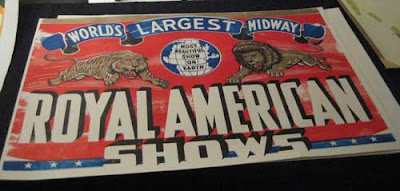 Red Royal American Shows circus poster with a lion and tiger leaping