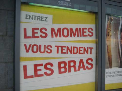 Poster that says Entrez - Les Momies Vous Tendents les Bras
