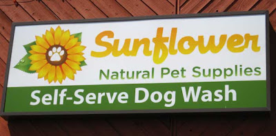 Natural pet supply store sign with tagline, Self-Serve Dog Wash