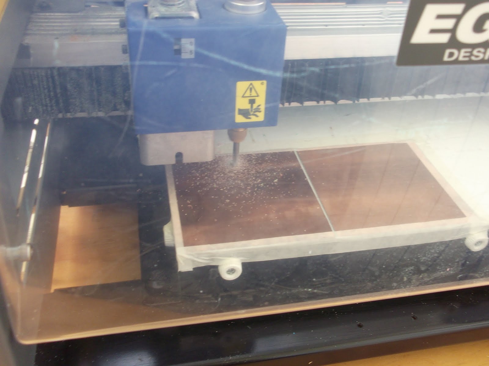 Speaker Design PHOTOS OF PCB BOARDS BEING CUT ON MACHINE