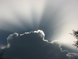 RAYS OF HOPE BEYOND THE DARK CLOUDS