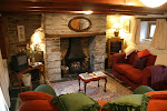 Rooky's Nook cosy sitting room with log fire