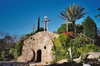 Empty tomb of Jesus Christ and Cross above the tomb free Christian religious image
