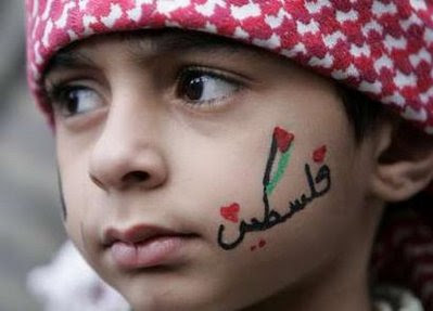 A+boy+with+the+word+PALESTINE+written+on+his+face+takes+part+in+a+protest+against+the+Israeli+blockade+of+the+Gaza+Strip+in+Amman+December+5+2008+Reuters.jpg