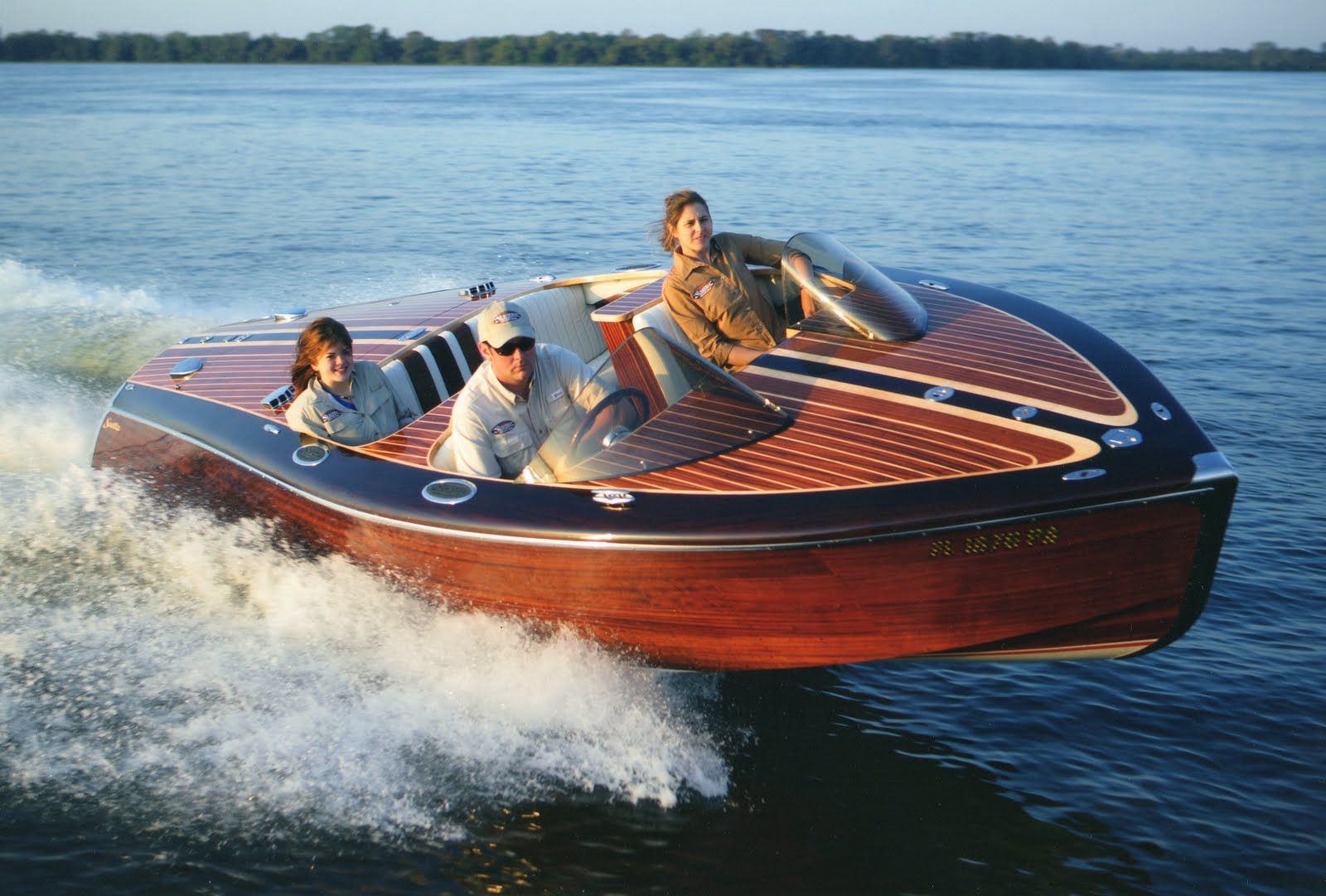 wooden boat with the convenience of a modern ski boat