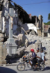 Crucifix left standing in rubble of cathedral in Port au Prince