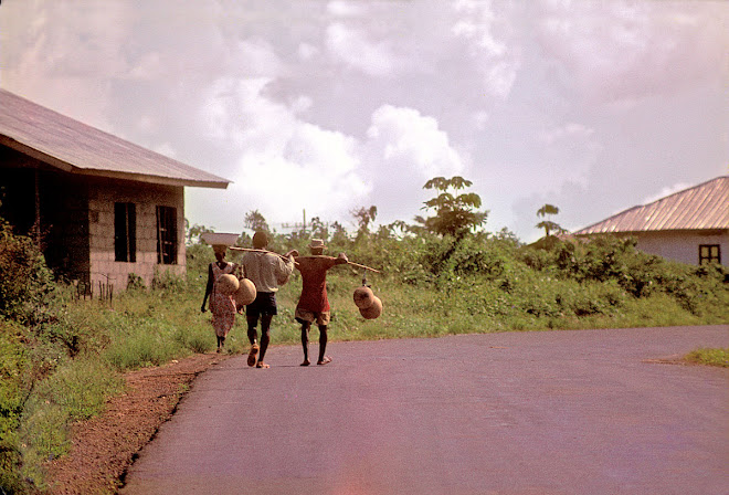 heading to Kenema to sell palm wine - Blama Rd in Kenema