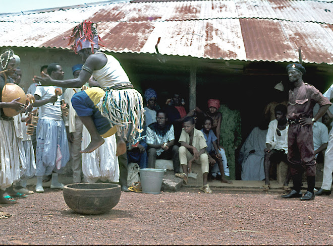 Fula acrobat at Pa Maju Bah's house in Kenema