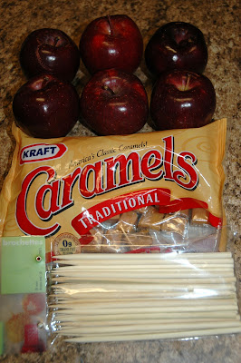 Ingredients and items needed to make caramel apples recipe by KidsActivitiesBlog.com