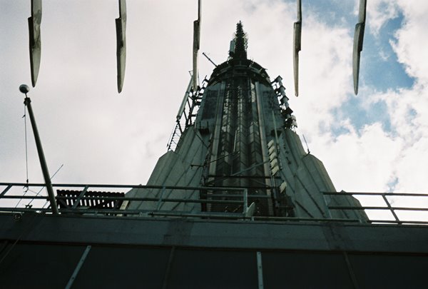 A closeup of the Empire State Building tower