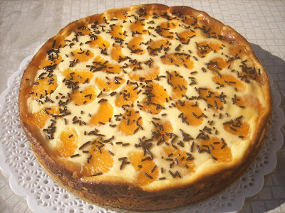 Tarta de queso y mandarinas