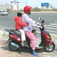 El carné por puntos y la nueva Ley de Tráfico - moto con niños