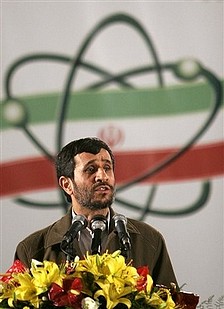 [Ahmadinejad+at+Natanz+with+nuke+symbol+and+flowers.jpg]