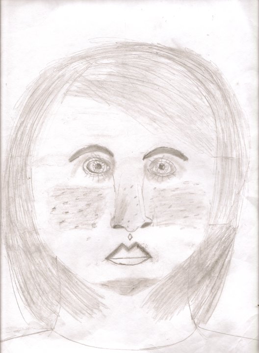 My 8 year old daughter Kaitlyn's self portrait.