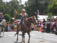 Coolest Cowboy Hui followed by Russ the Saddlemaker in the Makawao, Maui, Hawaii, Fourth of July Parade, 2009