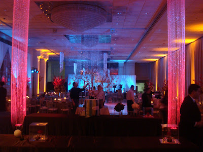 long crystals with pink uplight on the buffet area 