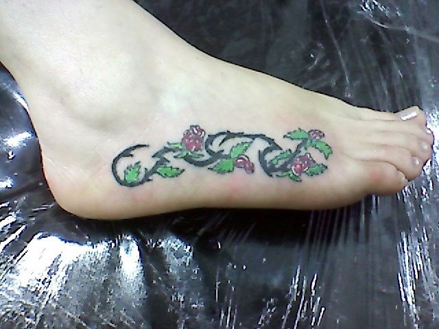 Imagenes de tatuaje con flor para la pelvis,  terror