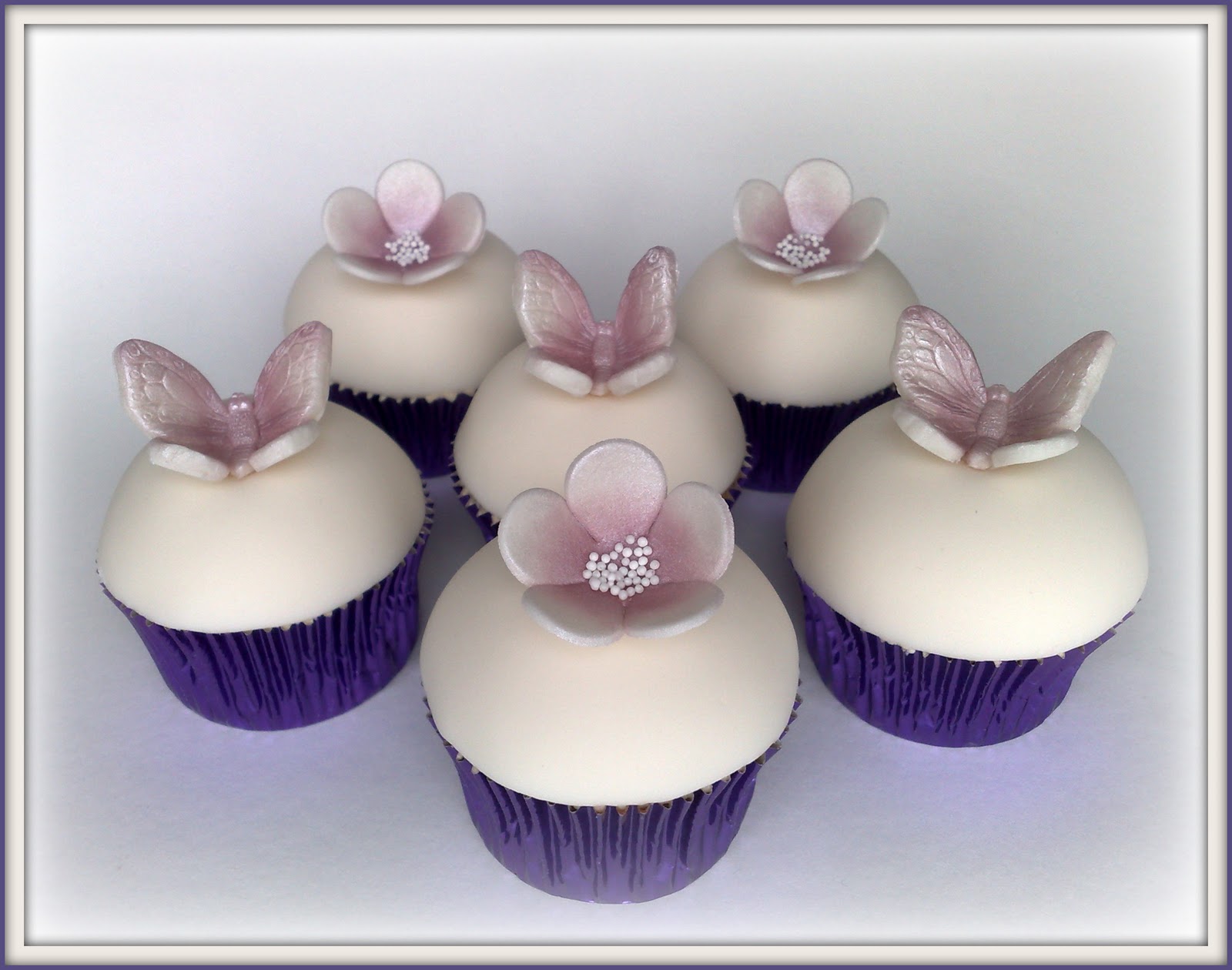 Small Things Iced Simple Domed Cupcakes
