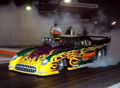 Auto Drag Racing on Drag Racing Is A Sport Wherein Two Cars Race Down A Defined Distance