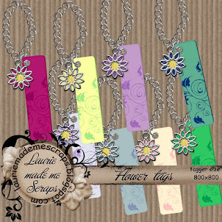 http://lauriemademescraps.blogspot.com/2009/06/flower-tags-freebie.html