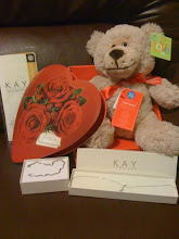 Our Valentine Gifts!! I bought Robertand Alyssa the Teddy Bear, Choclate and roses!!