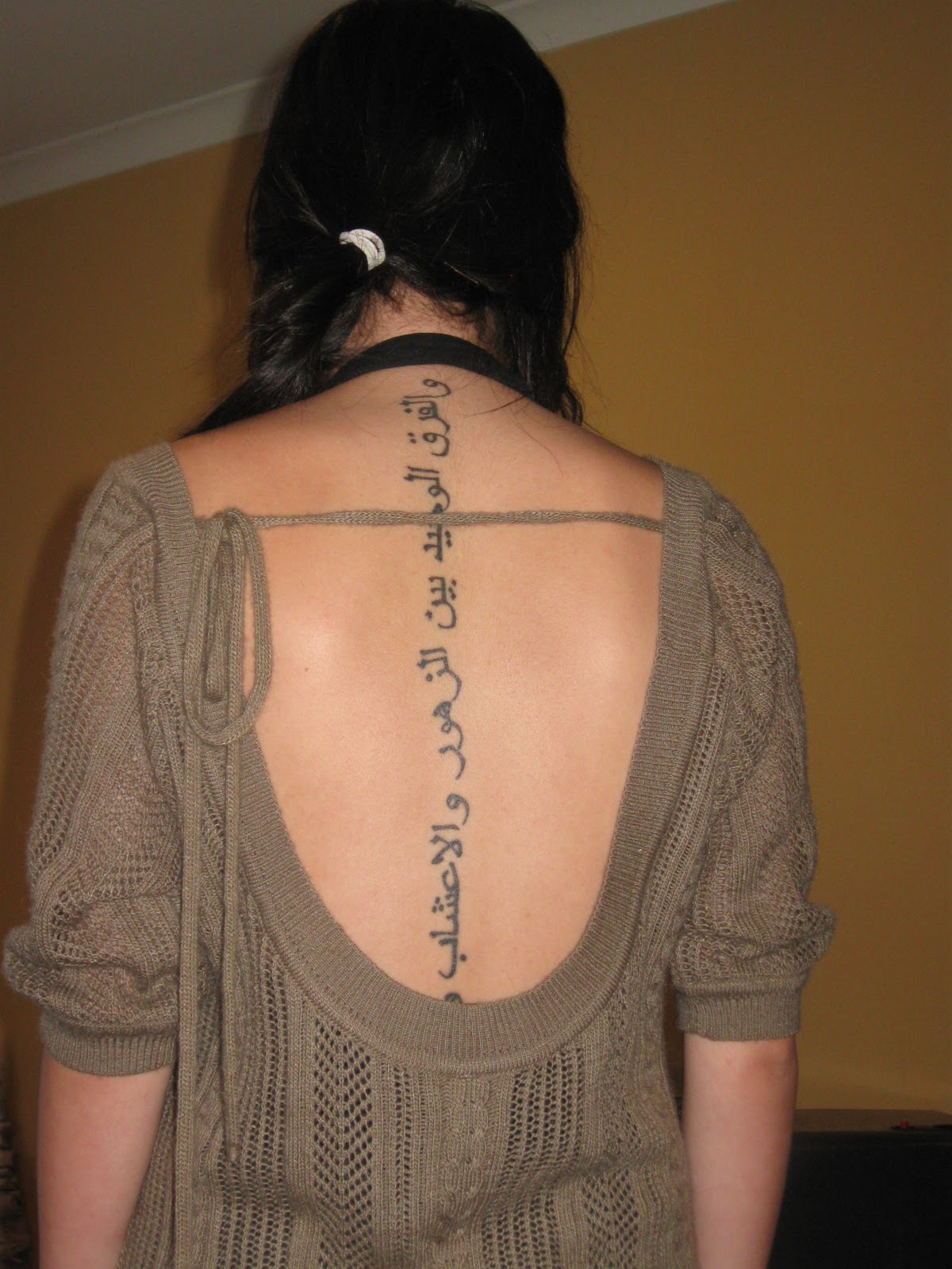 Allan Dicen: Arabic Tattoo