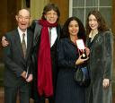 Sir Mick at Buckingham Palace with dad and two daughters