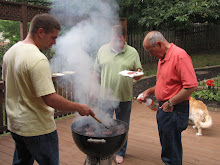 The men, the grill, and the smoke
