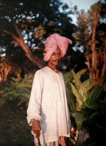 A man wearing a pink turban poses for a picture - 1926