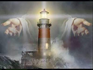 God Jesus Christ saving hands with light house background religious Christian photo