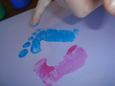 Blue painted finger finishing sign