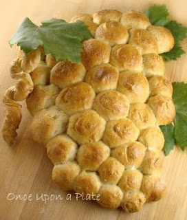 Bread made into the shape of a bunch of grapes