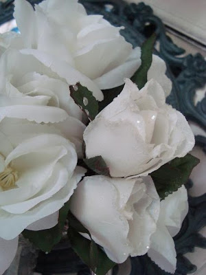 Closeup of white fabric roses