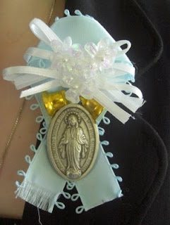 Light blue ribbon with medal of mercy