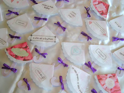 Display of multiple umbrella-shaped invitations