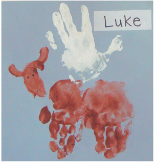 Hand-print painting of an ox for Luke