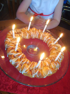 Cinnamon roll wreath bread with candles