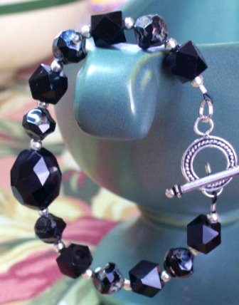 Unique glass beads and a natural stone centerpiece, sterling silver clasp - bracelet - $28