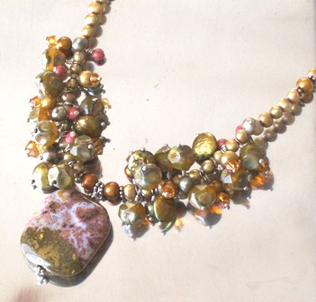 Golden freshwater pearl necklace festooned with coin pearls, faceted glass beads and more! $78