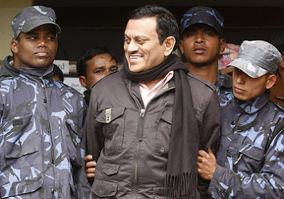 Amit Kumar speaks to the media while in police custody in Kathmandu on Feb. 8, 2008. 