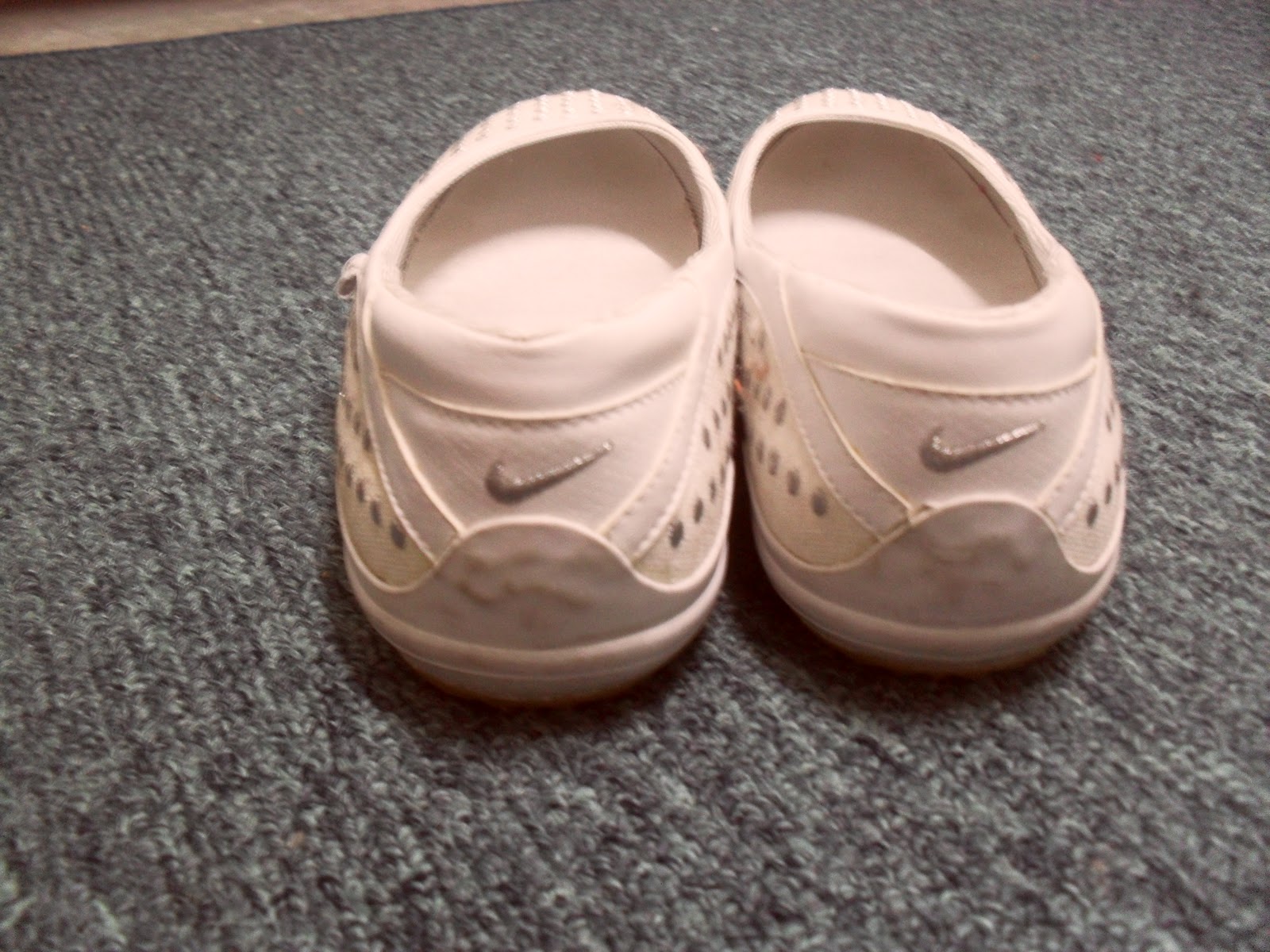 white and silver nike shoes