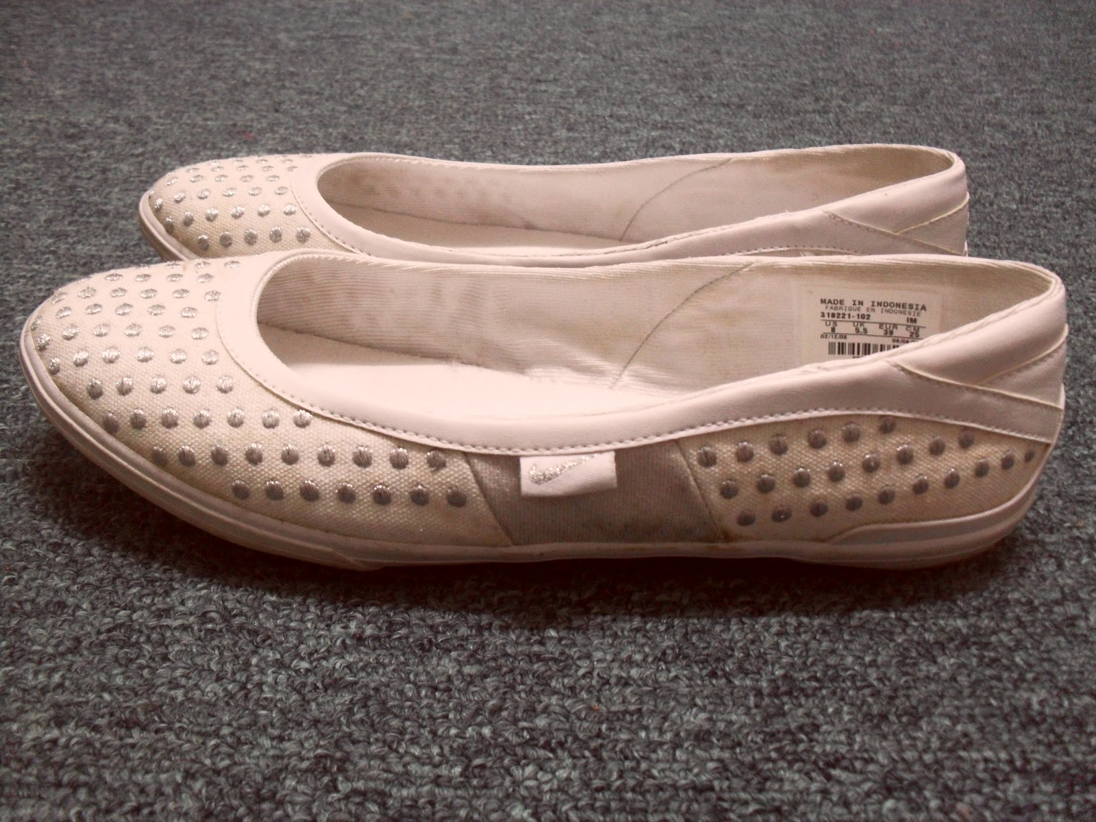 white and silver nike shoes