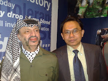 With Mr Yasser Arafat at Madame Tussaud Museum