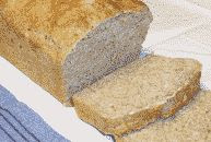 color photograph of a sliced beer bread loaf