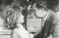 still cropped image of the main character confronting a surviving woman from the black and white film 'The Last Man on Earth' starring Vincent Price