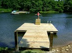How To Build A Pier In A Pond / How Much Does It Cost To Build A Dock / Create a border around the pond with rocks or stones.
