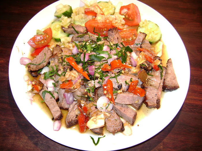 Beef Salad with chilli onions and citrus leaves Lemon juice