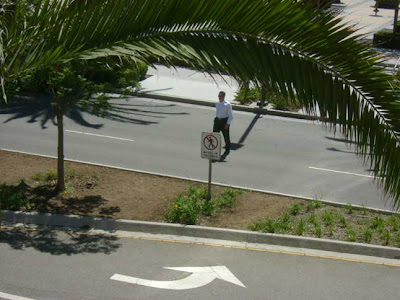 Man Approaching Sign