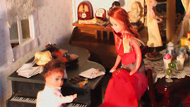 learning the piano with April doll
