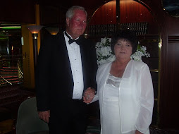 Presenting Mr. and Mrs. Ted Henley after ceremony on board ship